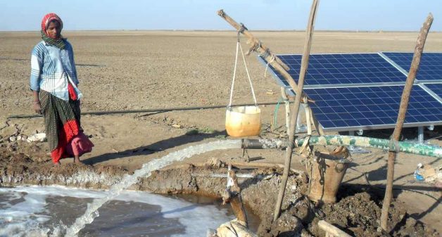 Replacing diesel pumps with solar pumps to lift brine has reduced the production cost of Agariya saltpan farmers. Photo credit: SEWA